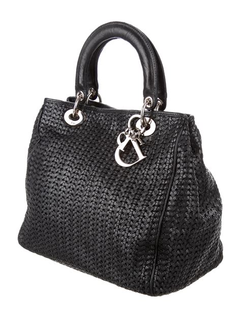 christian dior woven leather handbag.